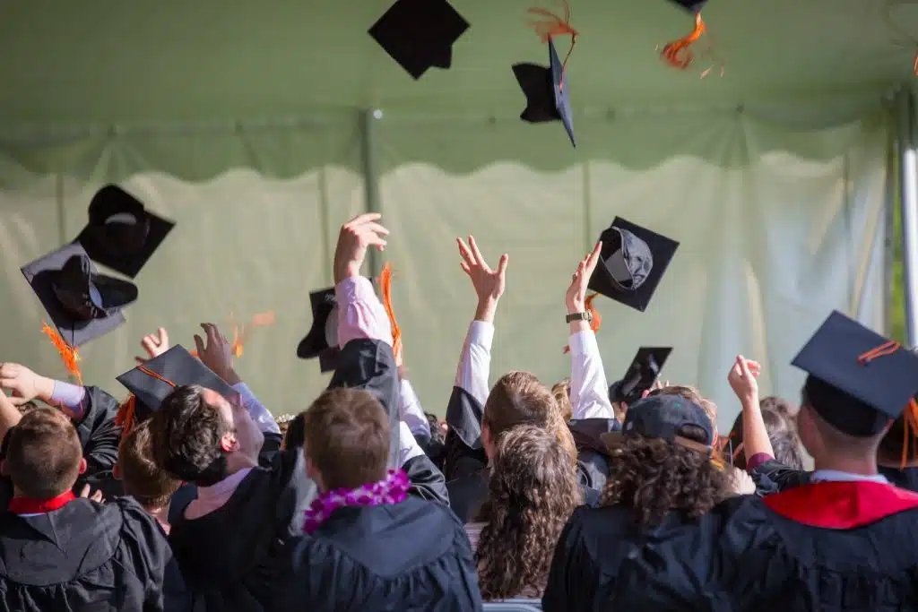 the image depicts students at their graduation ceremony that will move on to careers for top consulting firms such as McKinsey, BCG, and Bain. They are looking for the best degree for management consulting