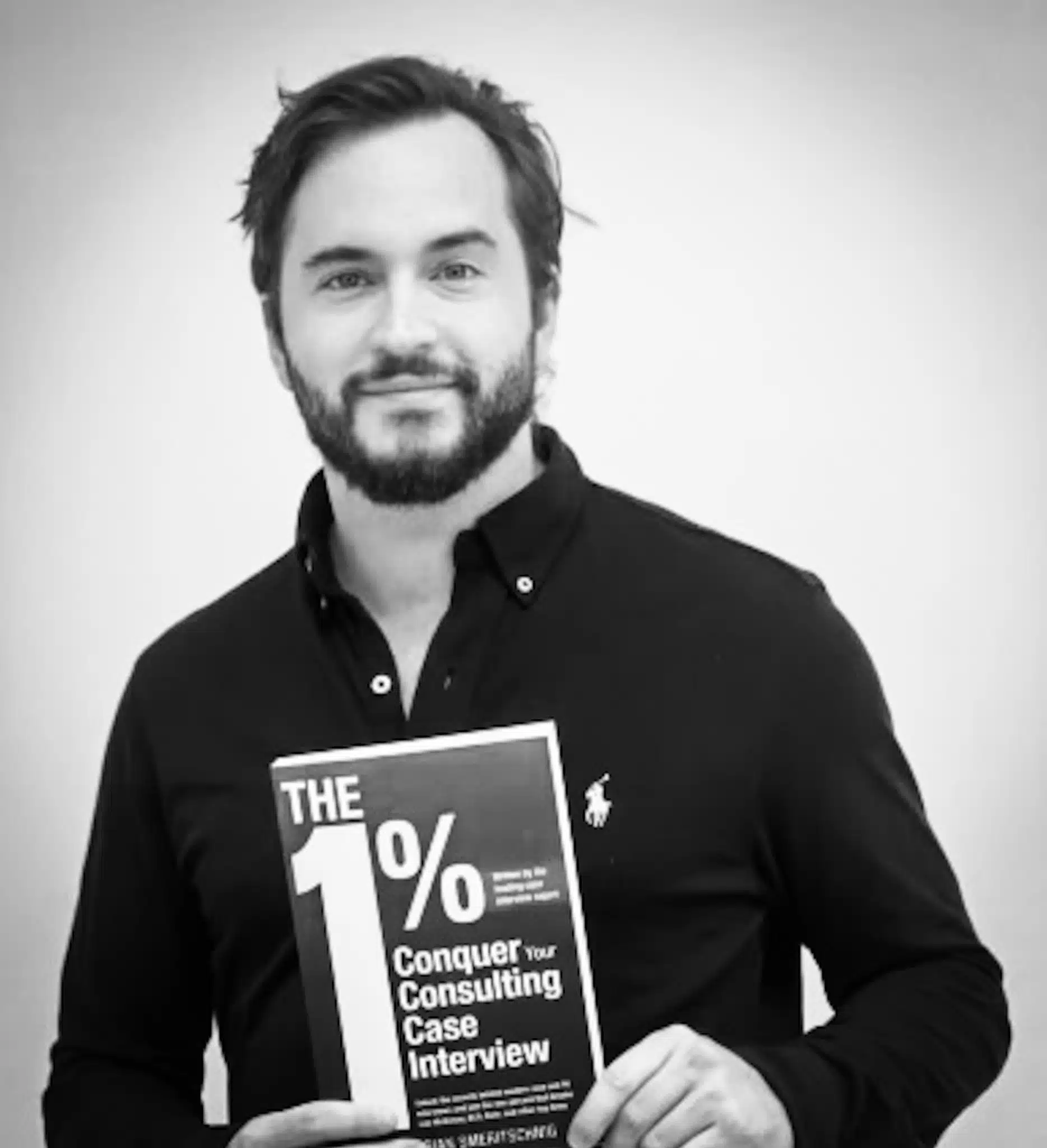 an image of florian smeritschnig with his book the 1% conquer your consulting case interview
