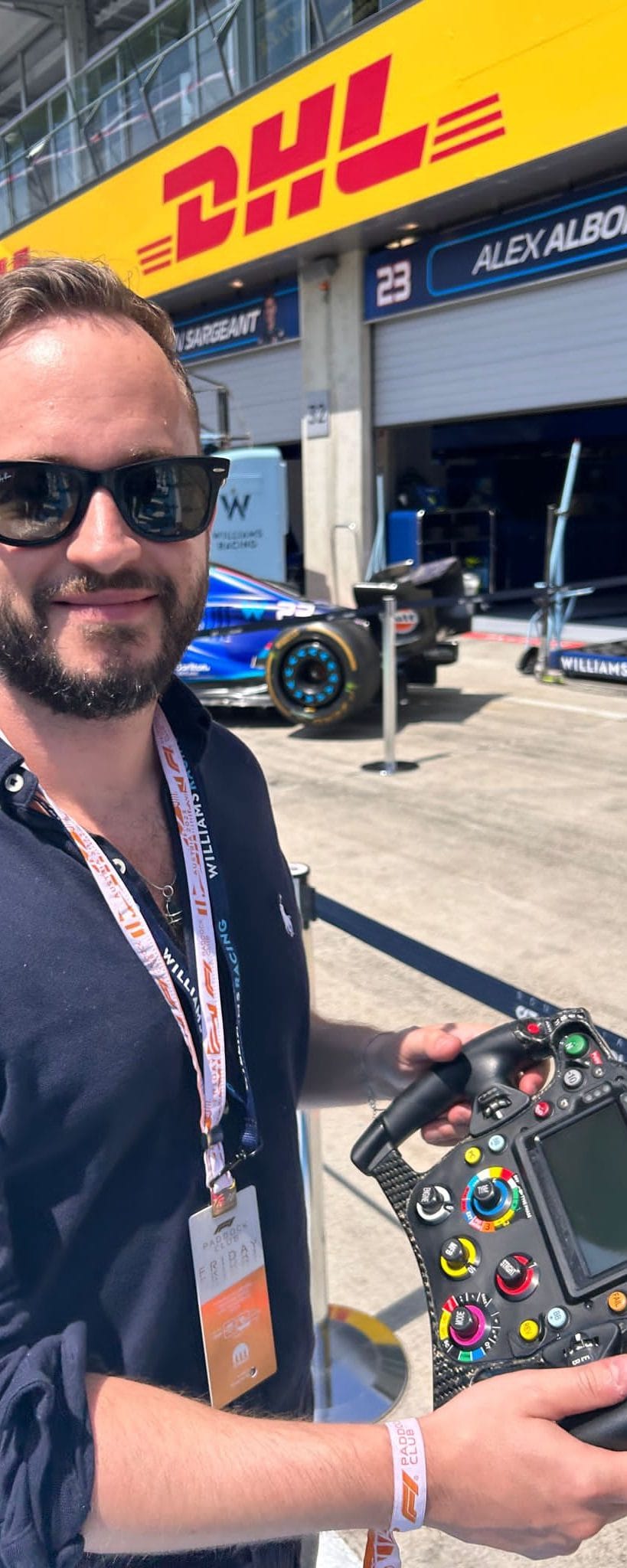 The image shows Florian Smeritschnig at a Formula 1 race