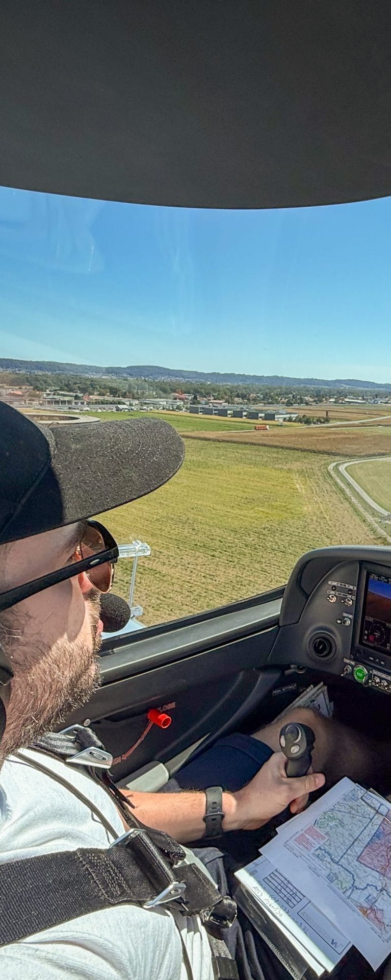 The image shows Florian Smeritschnig flying a plane